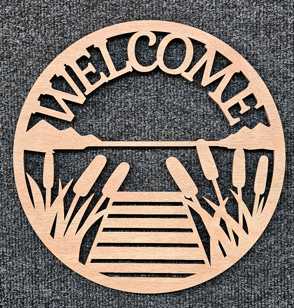 Reeds & wharf welcome sign