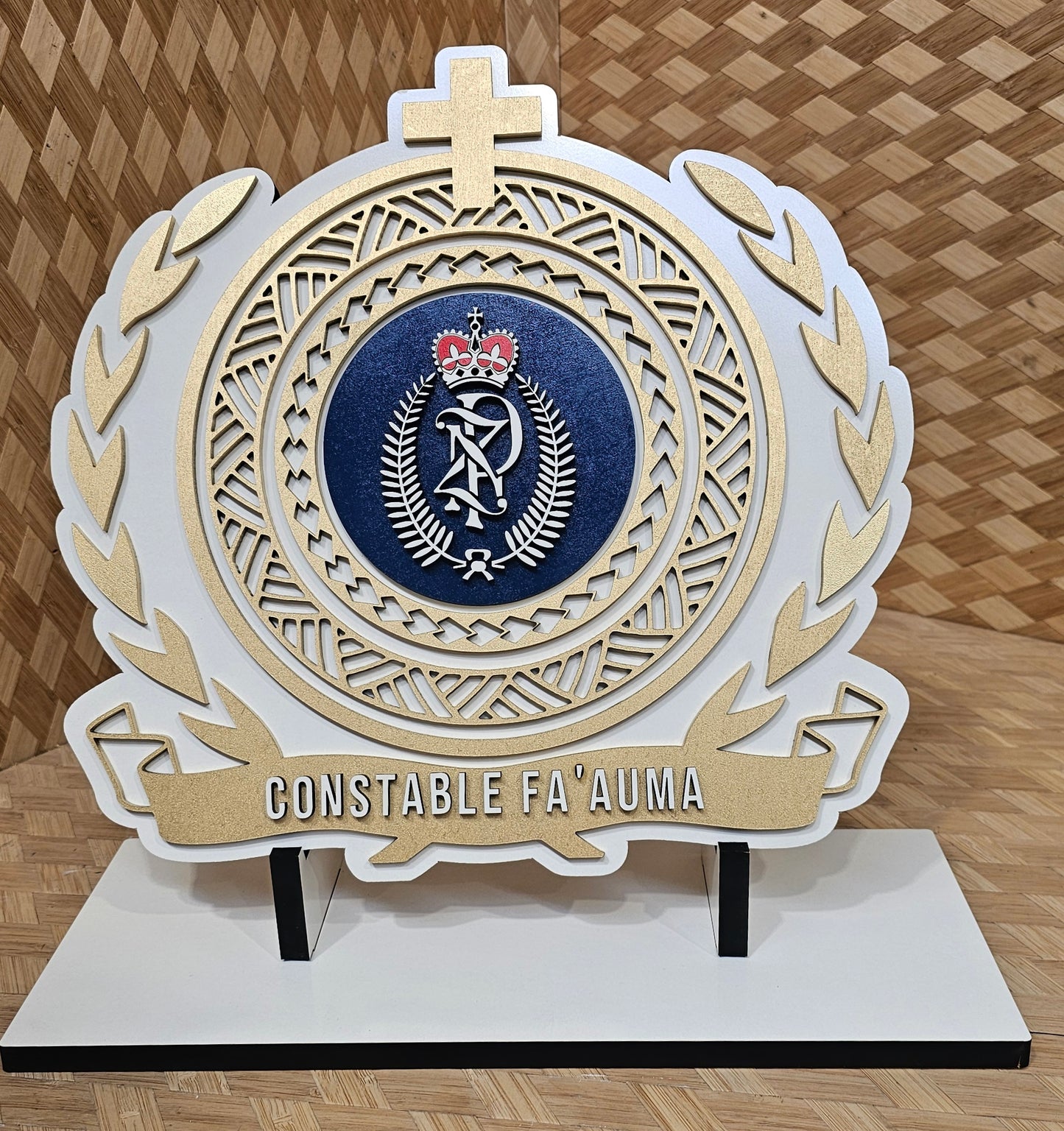 Samoan plaque with logo in middle